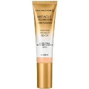 Fonds de teint &amp; Bases Max Factor Miracle Touch Second Skin Found....