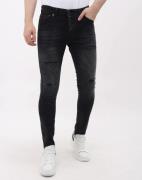 Mario Morato Slim fit ripped jeans met verfspatten mm