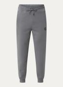 HUGO Dimacs tapered fit joggingbroek met logo en steekzakken