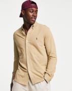 Polo Ralph Lauren player logo slim fit pique shirt button down in tan ...