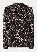 ba&sh Delphine top met stippenprint en asymmetrisch detail