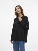 Blouse fluide, col V