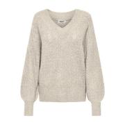 Pull maille brillante, col V