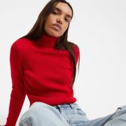 Pull col roulé en fine maille
