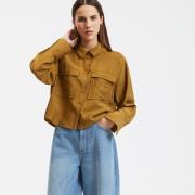 Chemise courte et ample, manches longues