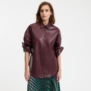 Chemise en simili, Signature APOLLINE