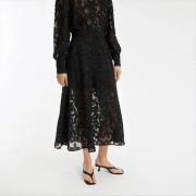 Jupe évasée, longue, en voile dévoré